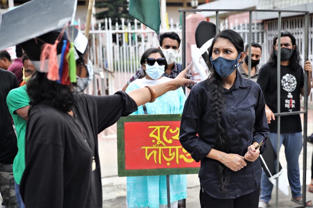 Artists perform during a protest against the arrest of journalist Rozina Islam, in Dhaka, Bangladesh, 20 May 2021, Syed Mahamudur Rahman/NurPhoto via Getty Images