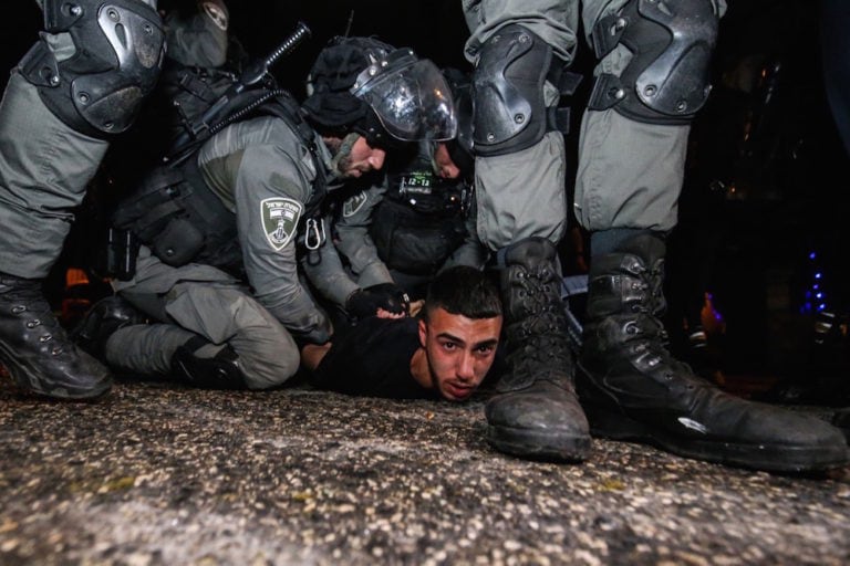 Israeli forces detain a Palestinian at the Sheikh Jarrah neighborhood, during a protest in response to the Israeli government's plan to force some Palestinian families out of their homes in East Jerusalem, 5 May 2021, Mostafa Alkharouf/Anadolu Agency via Getty Images