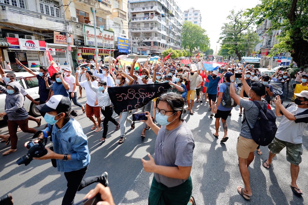 Journalists take pictures and video footage during a flash mob protest against the military coup, in central Yangon, Myanmar, 6 May 2021. Myat Thu Kyaw/NurPhoto via Getty Images