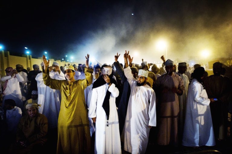 In 2011, a peaceful movement began in the Governorate of Sohar calling for comprehensive political, economic and social reforms; in this photo, anti-government protesters in Seeb, Oman, 7 March 2011, on the ninth consecutive day of protests. ROBIN UTRECHT/AFP via Getty Images