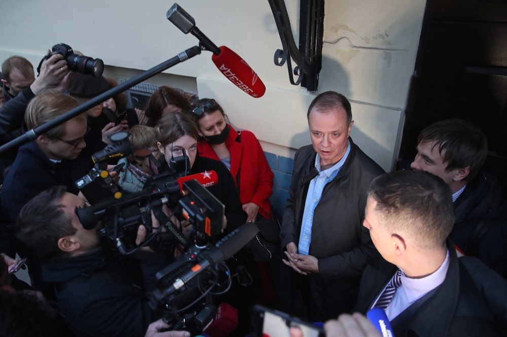 Lawyer Ivan Pavlov (C back), who is facing a criminal charge for disclosing pre-trial investigation findings, talks to journalists outside Moscow's Basmanny District Court after a remand hearing, 30 April 2021, Vyacheslav ProkofyevTASS via Getty Images