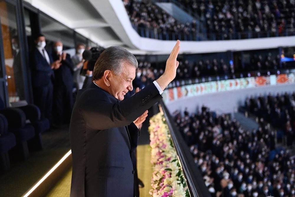 President of Uzbekistan Shavkat Mirziyoyev greets the audience at an official celebration marking the Newroz festival, in Tashkent, Uzbekistan, 21 March 2021, Presidency of Uzbekistan / Handout/Anadolu Agency via Getty Images