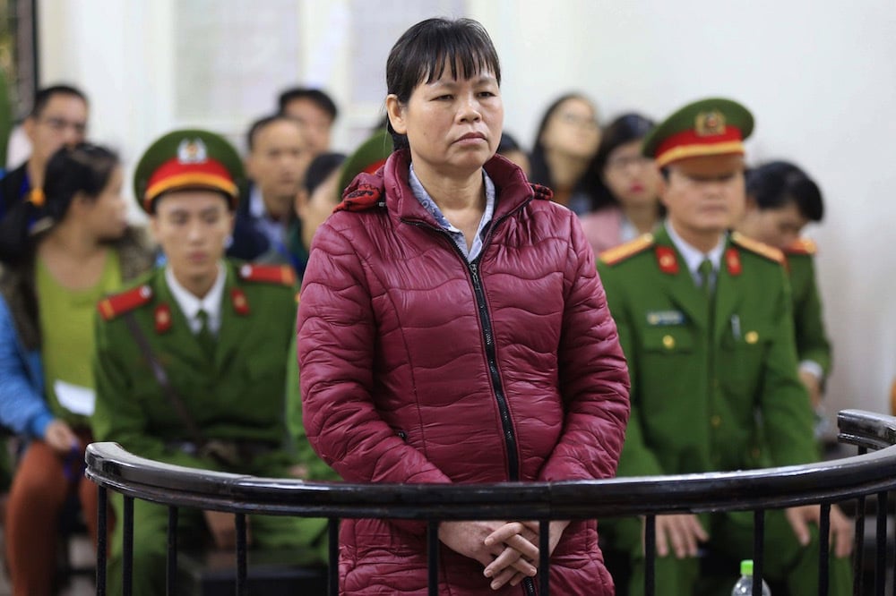 Land rights activist Can Thi Theu (C) stands in the dock during her appeal in a former indictment, at the Hanoi People's Court, Vietnam, 30 November 2016, VIETNAM NEWS AGENCY/AFP via Getty Images