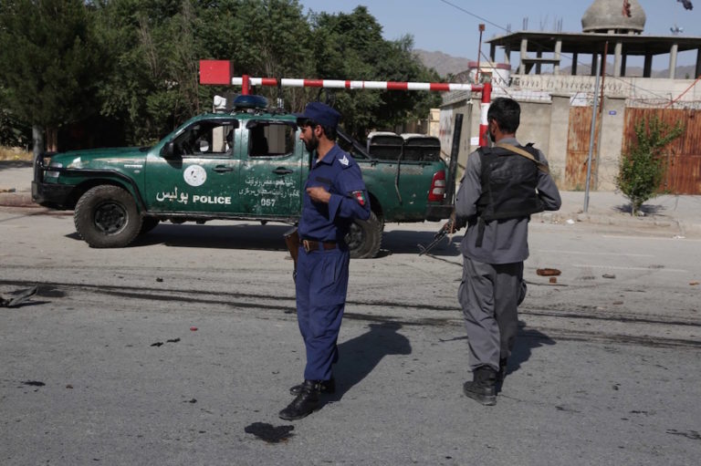 Afghan security force members stand at the site of the blast in Kabul, 3 June 2021, Sayed Mominzadah/Xinhua via Getty Images