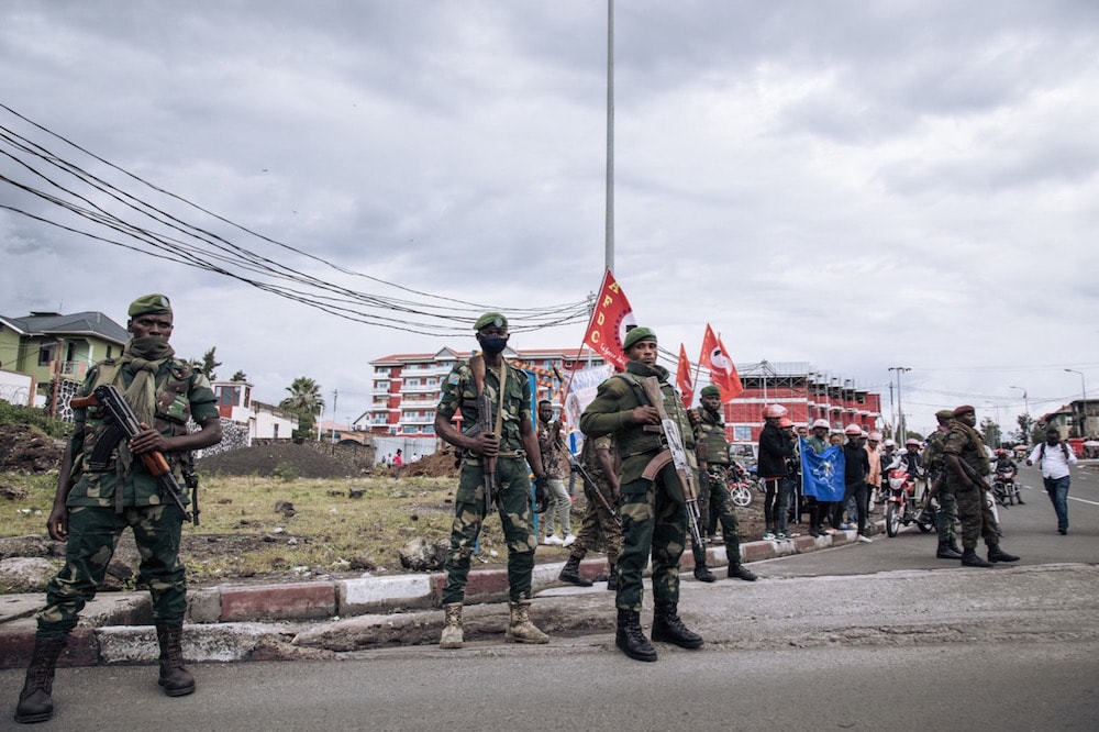 Congolese soldiers stand guard outside the entrance to the governorate, in Goma, capital of Nord-Kivu, Democratic Republic of Congo, 10 May 2021, ALEXIS HUGUET/AFP via Getty Images