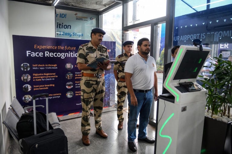 A passenger registers his personal details at a facial recognition counter, at the Rajiv Gandhi International Airport in Hyderabad, India, 26 July 2019, NOAH SEELAM/AFP via Getty Images