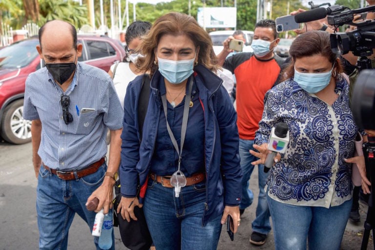 Journalist María Lilly Delgado (C), of Univision, arrives at the Public Ministry where she was summoned to provide information regarding an alleged money laundering investigation against presidential pre-candidate Cristiana Chamorro, in Managua, Nicaragua, 25 May 2021, INTI OCON/AFP via Getty Images