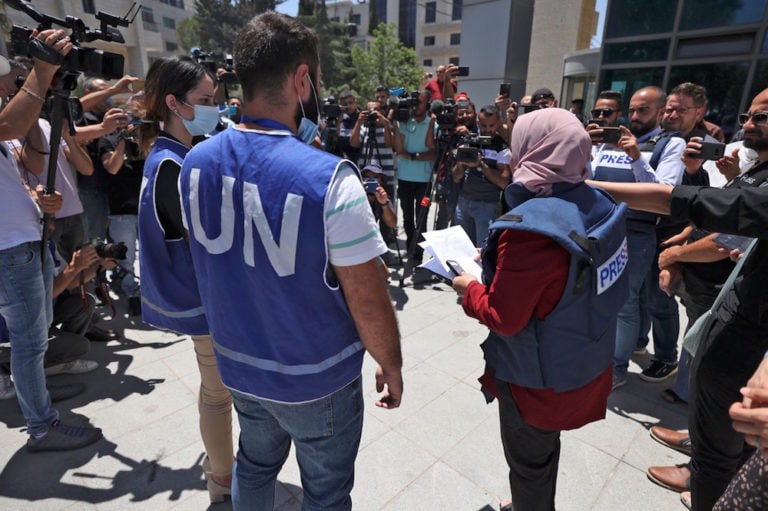 Journalists protest outside the United Nations office in the occupied West Bank city of Ramallah, 28 June 2021, calling for protection following attacks by Palestinian security forces on their colleagues during protests, ABBAS MOMANI/AFP via Getty Images
