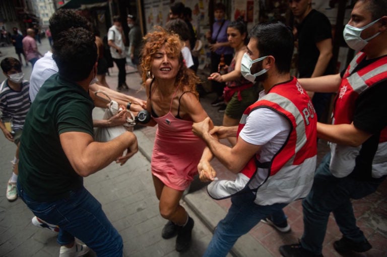 Protesters are detained by police in central Istanbul, Turkey, on 26 June 2021, as hundreds of LGBTQI+ activists defied a ban and tried to stage a gay pride event. BÜLENT KıLıÇ/AFP via Getty Images