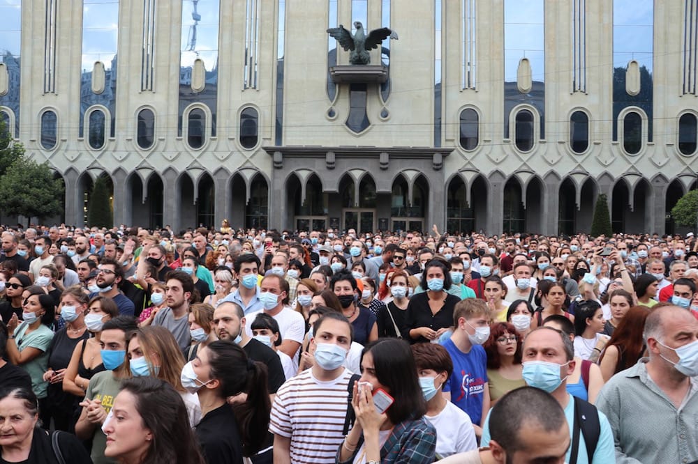 Tbilisi, Georgia, 11 July 2021. People gather in front of the parliamentary building to stage a demonstration after the death of Aleksandr "Lekso" Lashkarava, days after he was attacked while covering the 5 July counter-demonstration against a Pride march. Davit Kachkachishvili/Anadolu Agency via Getty Images