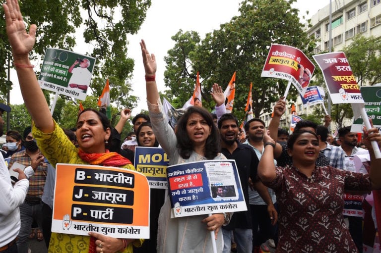 Members of the Indian Youth Congress stage a protest following media reports on the use of Pegasus spyware, near the Parliament in New Delhi, 20 July 2021, Mohd Zakir/Hindustan Times via Getty Images