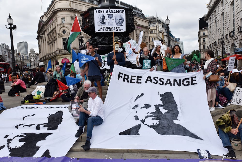 Supporters of Julian Assange protest on his 50th birthday and call for his release, at Piccadilly Circus, London, UK, 3 July 2021, Matthew Chattle/Barcroft Media via Getty Images