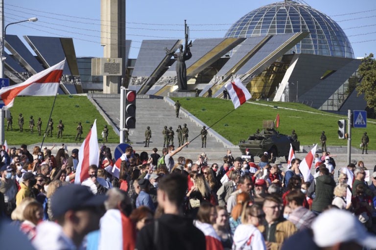 Officers guard an area near the Minsk Hero City Obelisk as opposition supporters gather in response to a call to blockade the Presidential Palace and the Supreme Court, in Minsk, Belarus, 20 September 2020, Marina Serebryakova/Anadolu Agency via Getty Images