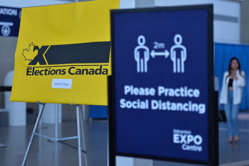 COVID-19 and Elections Canada related signs, inside the Edmonton Expo Center, Edmonton, Alberta, 20 August 2021, Artur Widak/NurPhoto