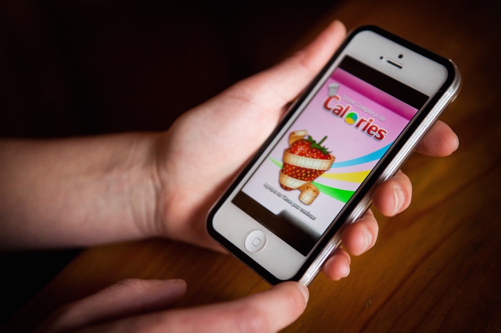 A person suffering from anorexia uses a calorie counting app, 22 June 2013, BSIP/Universal Images Group via Getty Images