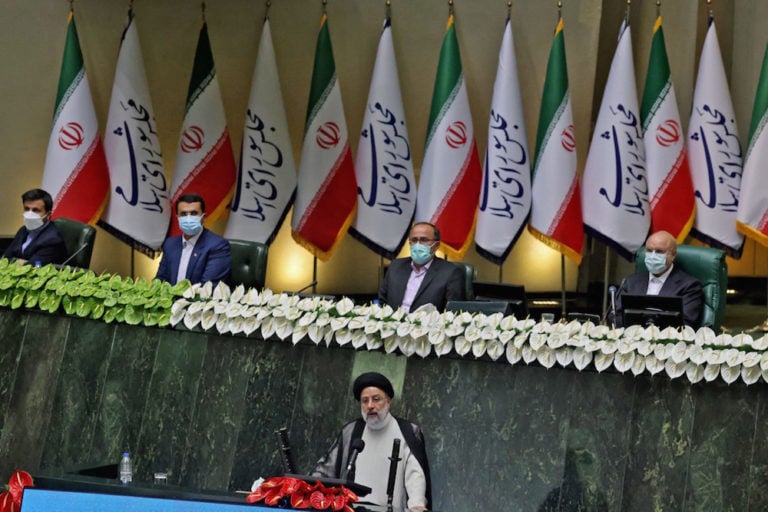 Iran's newly elected President Ebrahim Raisi speaks during his swearing in ceremony at the Parliament, in Tehran, 5 August 2021, ATTA KENARE/AFP via Getty Images