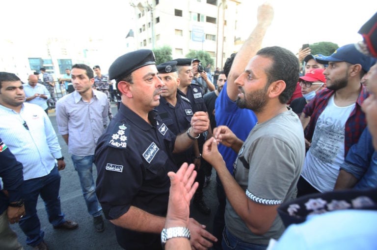 Police close the streets leading to the prime minister's office during a protest, in Amman, Jordan, 29 July 2020, after the arrests by security forces of top members of the Jordan Teachers Syndicate. Jordan PIx/Getty Images