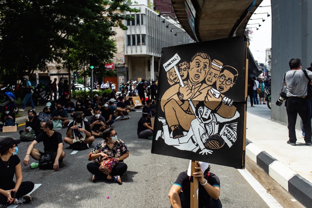 Hundreds of Malaysian youth gather in Kuala Lumpur to take part in the #Lawan protest demanding the Prime Minister's resignation, 31 July 2021, Aizat Ady Ikram/Pacific Press/LightRocket via Getty Images