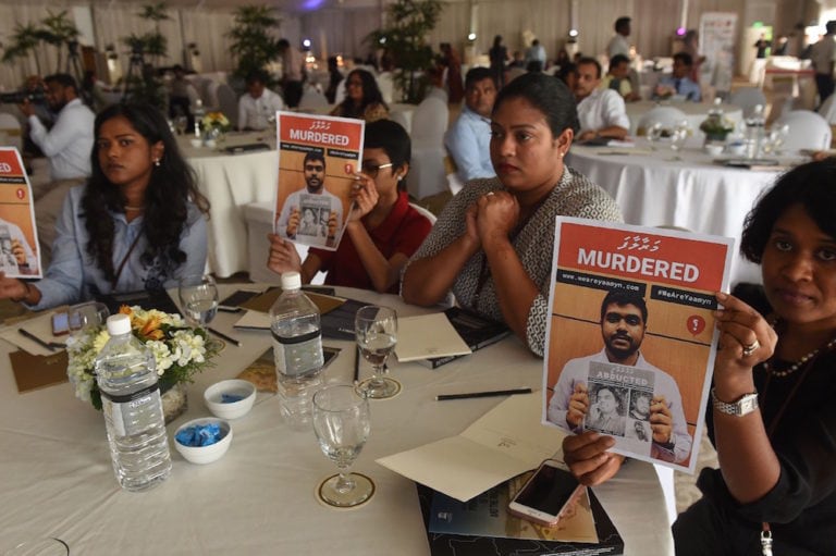 Maldives journalists take part in a demonstration against the murder of blogger Yameen Rasheed, at the opening of a regional seminar on the safety of journalists, in Colombo, Sri Lanka, 4 December 2017, ISHARA S. KODIKARA/AFP via Getty Images
