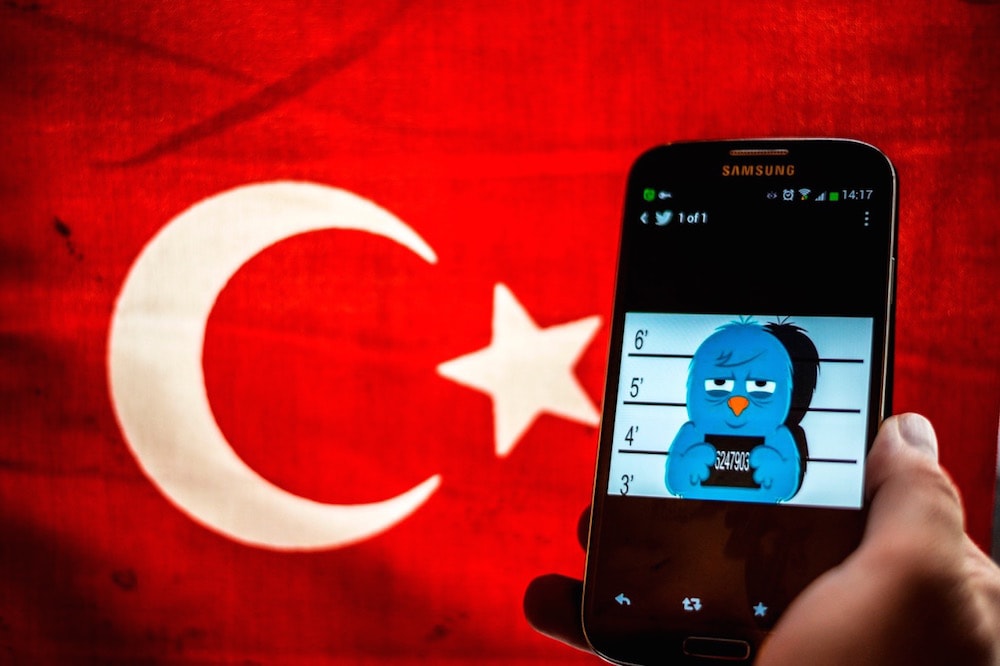 A picture representing a mugshot of the Twitter bird is seen on a smartphone, Istanbul, Turkey, 26 March 2014, OZAN KOSE/AFP via Getty Images