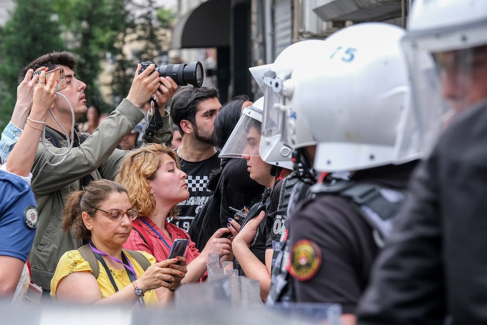 Members of the press who want to view the protesters of banned Pride marches are blocked by the police in Istanbul, Turkey. 18 June 2023. Mine Toz/SOPA Images/LightRocket via Getty Images